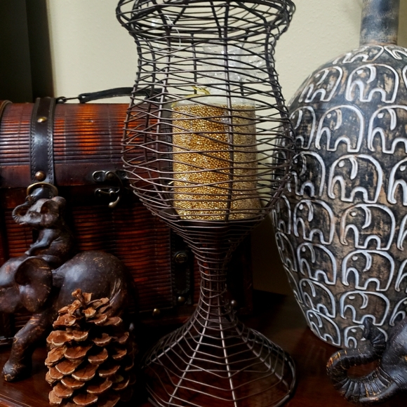 Tall Partylite apothecary pillar candle holder.